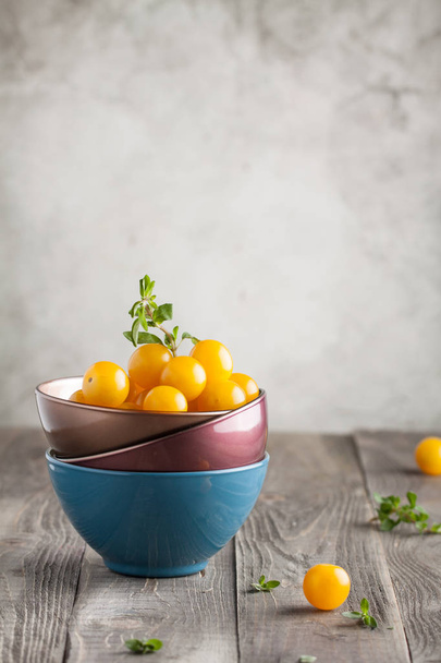 Yellow cherry tomatoes in bowls - Photo, image