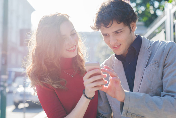 couple in love using smartphone - Foto, immagini