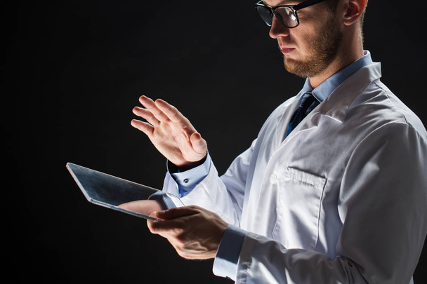 close up of doctor or scientist with tablet pc - Foto, Bild