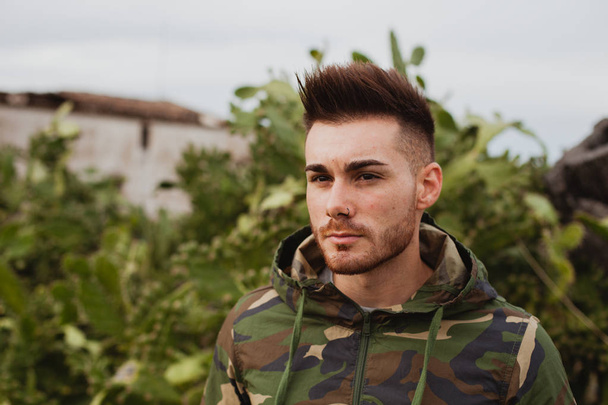 Attractive guy with military jacket  - Photo, Image