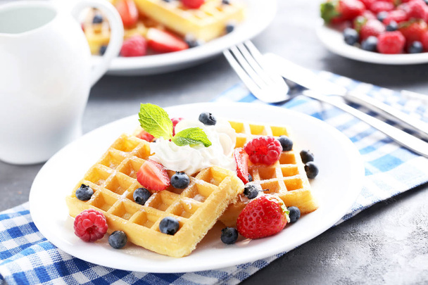 Homemade waffles with berries  - 写真・画像