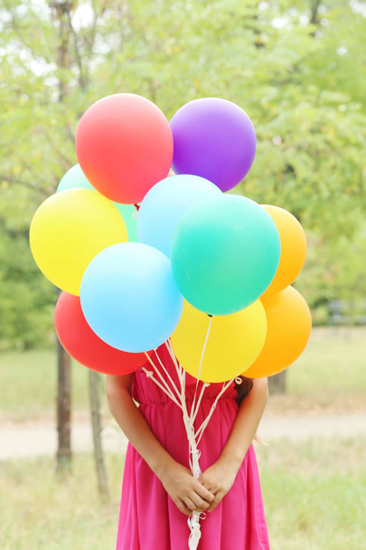 Colorful balloons outdoors - Φωτογραφία, εικόνα