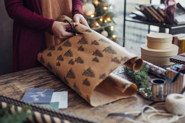 Woman Wrapping Christmas Presents - Фото, изображение