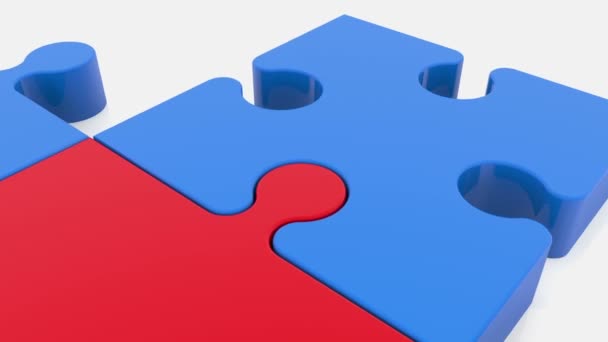 Piezas del rompecabezas en movimiento en colores rojo y azul
 - Imágenes, Vídeo