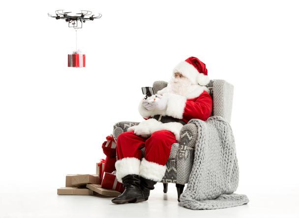 Santa Claus using drone  - 写真・画像