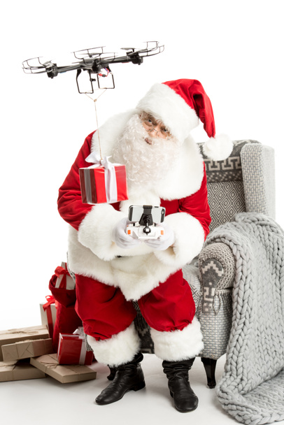 Papai Noel usando drone
  - Foto, Imagem