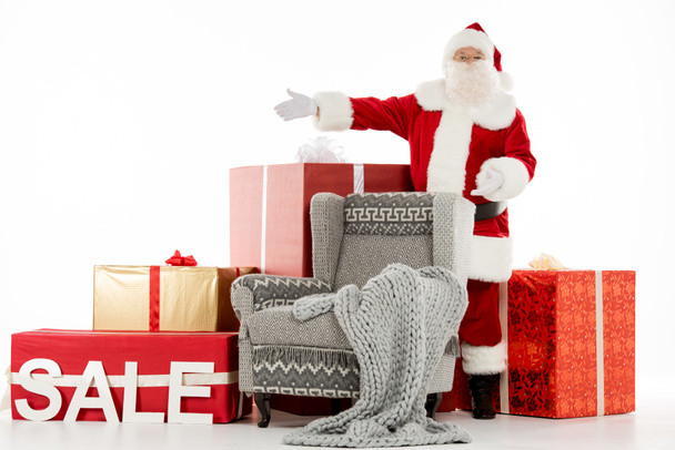 Ευτυχισμένος Άγιος Βασίλης με σημάδι πώλησης - Φωτογραφία, εικόνα