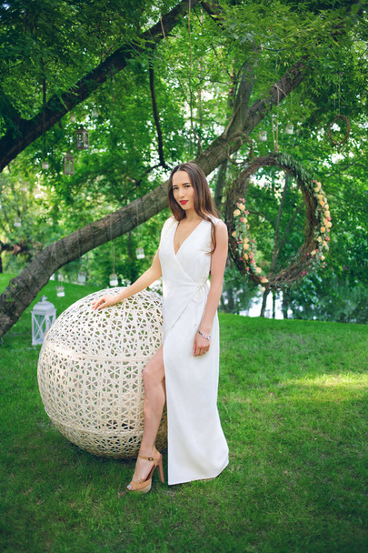 beautiful woman in white dress - Fotó, kép