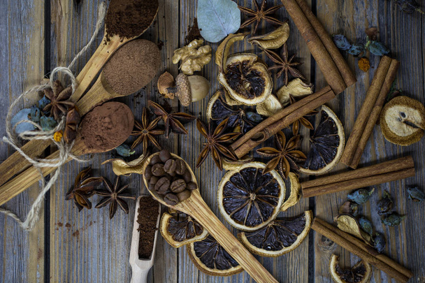 composition of dried lemon, cinnamon coffee - Photo, Image