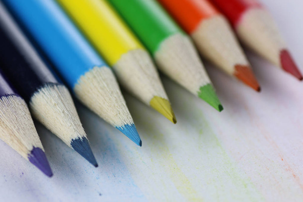 colored pencils on wooden table - Foto, Imagem