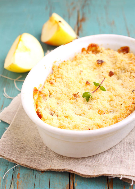 crumble with apples in white dish - Photo, Image