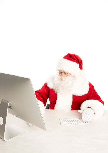 Santa Claus using computer - Φωτογραφία, εικόνα