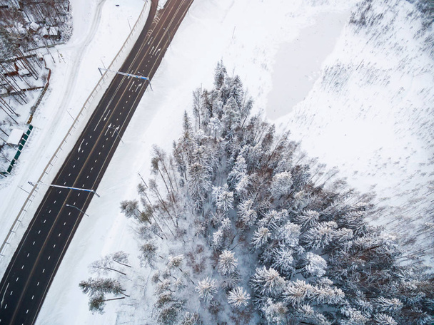 winter road intersection in the countryside with a bird's-eye view - Фото, изображение