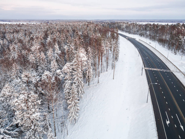 winter road intersection in the countryside with a bird's-eye view - Фото, изображение