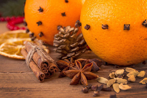 Ingredients for mulled wine over on wooden table. - Photo, Image