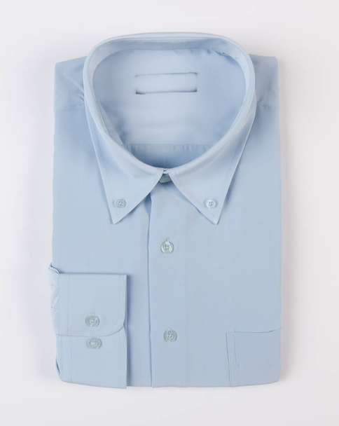 shirt for men's folded on a background. - Zdjęcie, obraz