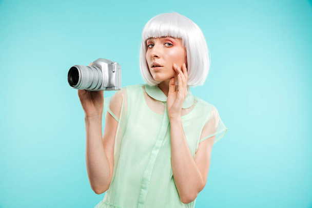 Portrait of woman fashion photographer with modern photo camera - Fotó, kép