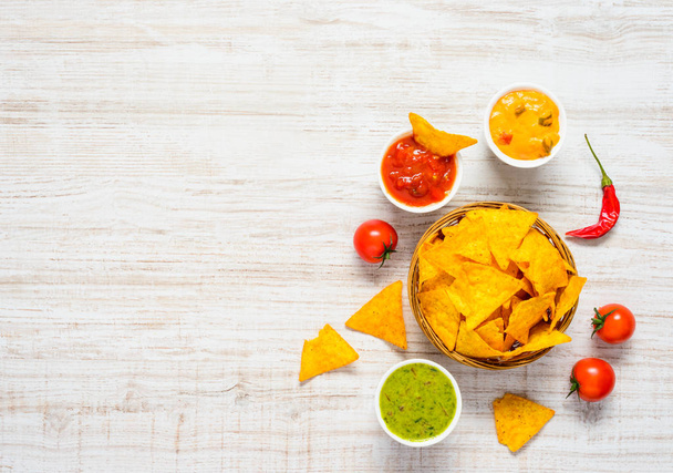 Tortilla Corn Chips with Guacamole Dip and Copy Space - Φωτογραφία, εικόνα