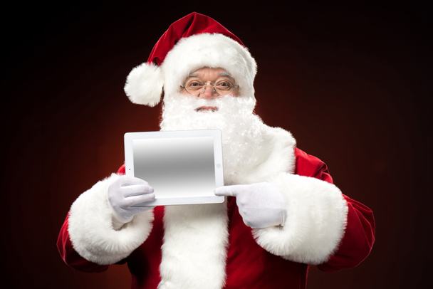 Santa Claus con tableta digital
 - Foto, Imagen