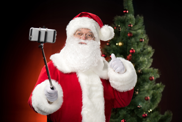 Santa Claus biorąc selfie   - Zdjęcie, obraz
