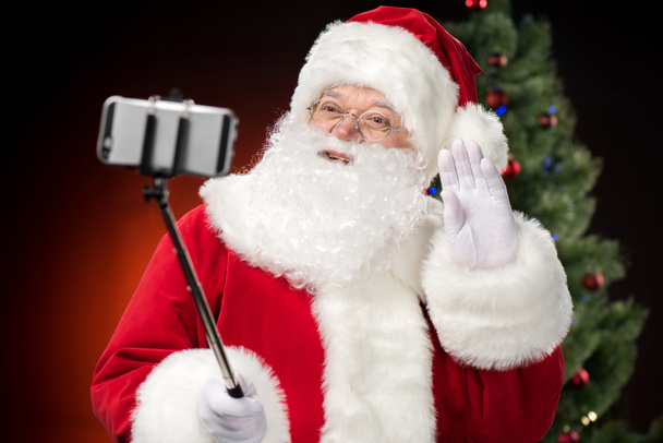 Santa Claus taking selfie   - Foto, imagen