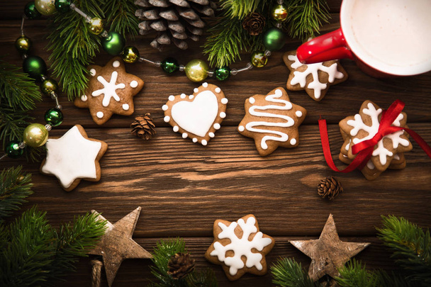 Christmas cookies on wooden background - Foto, Imagen