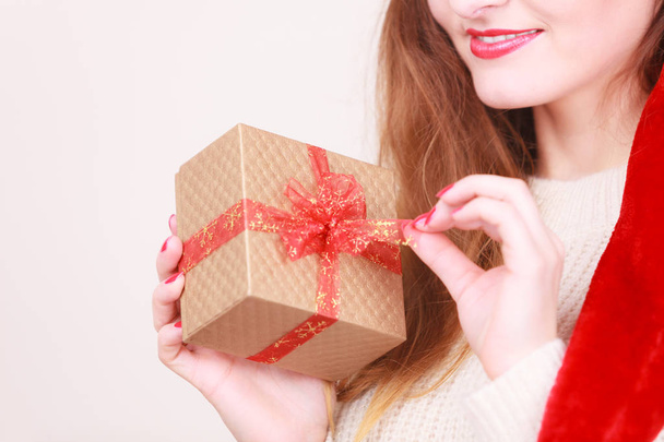 Woman opening gift box. Christmas time - Φωτογραφία, εικόνα