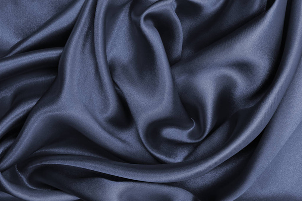 Smooth elegant dark grey silk or satin texture as abstract backg - Foto, Bild