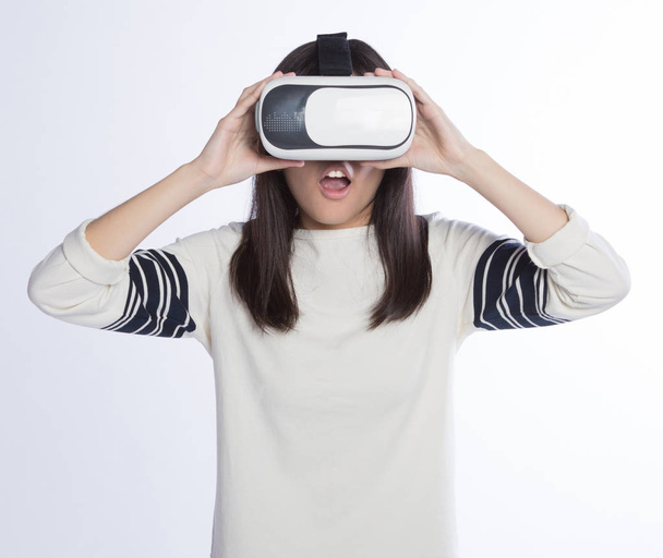 woman wearing VR headset - Foto, Bild