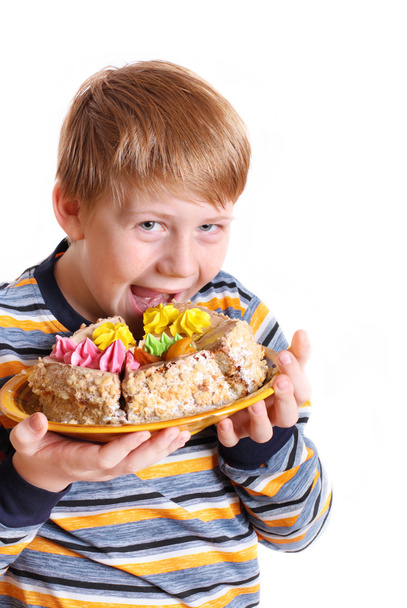 Boy with pie isolated on white - Photo, Image