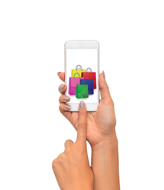 Kezében az online vásárlás koncepció szúró telefon képernyő - Fotó, kép