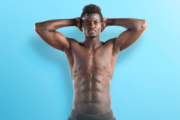 Strong black man posing in studio - Фото, зображення