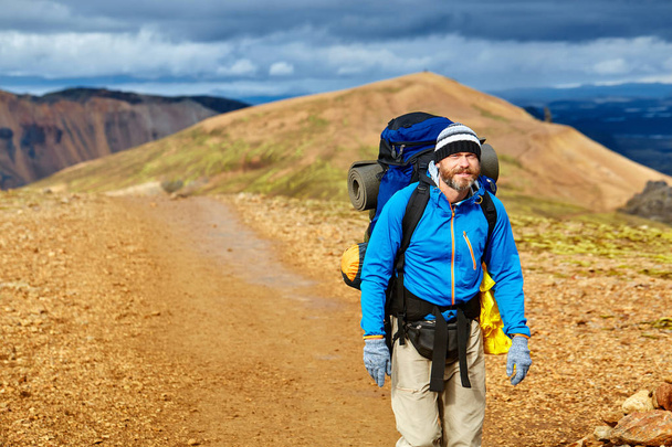 male hiker in the mountains, Iceland - 写真・画像