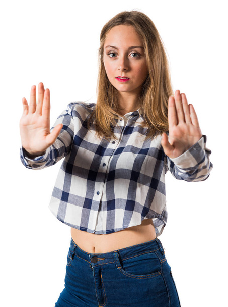 Blondynka Nastolatka Dokonywanie znak stop - Zdjęcie, obraz