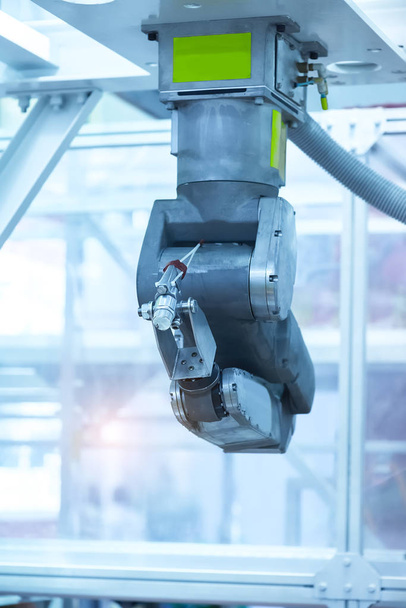 Controler van robotic hand in fabriek - Foto, afbeelding