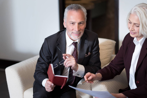 Cheerful businessman sharing points of view with the businesswoman - Photo, Image