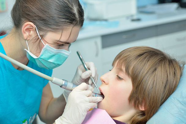 dentist curing child patient - Foto, Imagem