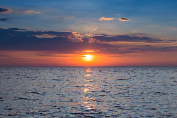 Zachód słońca nad morzem - Zdjęcie, obraz