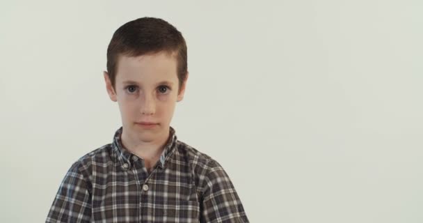 Little boy posing emotional - Materiał filmowy, wideo