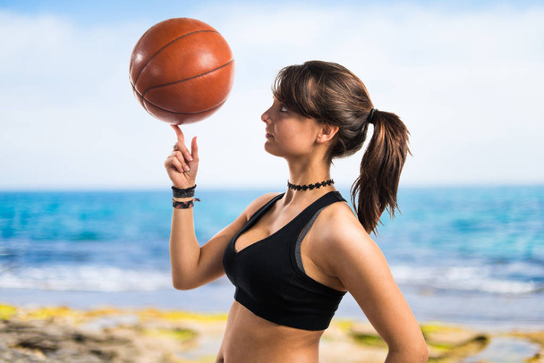Young girl playing basketball - Photo, Image