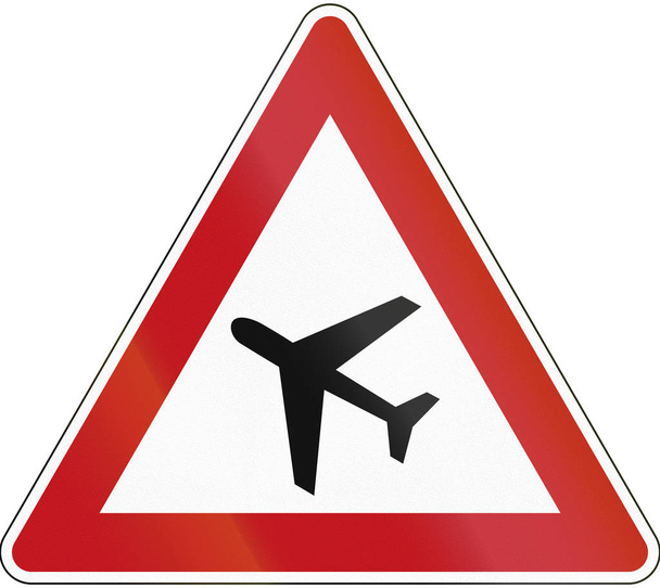 Дорожній знак Увага в Німеччині: низький, політ літаків - Фото, зображення