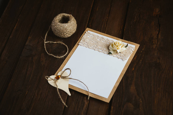 Cardboard card with flower - Фото, зображення
