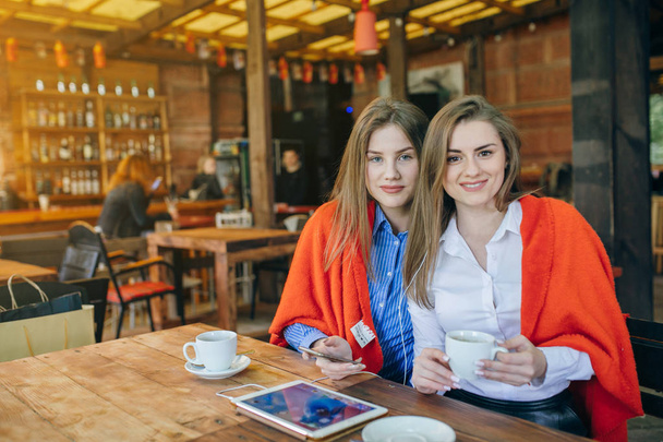 two girls in a cafe - Fotó, kép