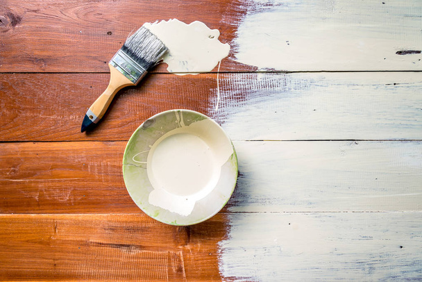 The Paint brush and  bowl  of white coating color  - Photo, Image
