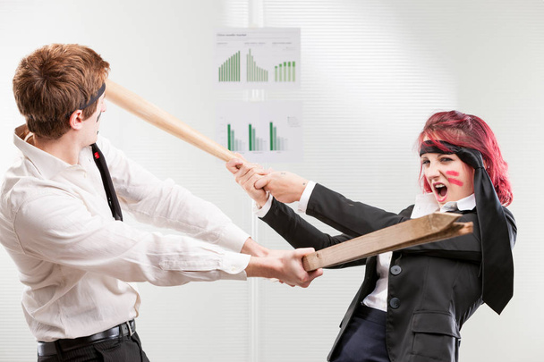 hit war woman against man in the workplace - Photo, Image