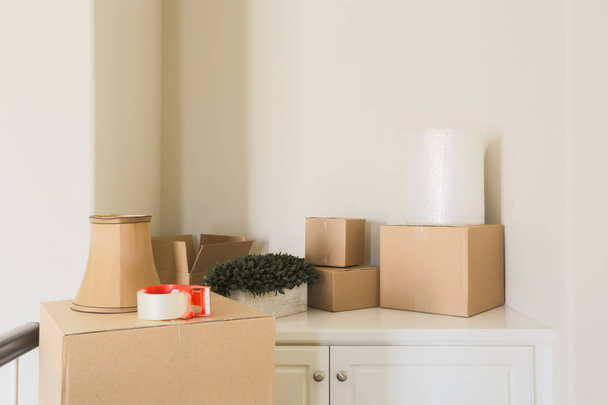 Variety of Packed Moving Boxes In Empty Room - Photo, Image