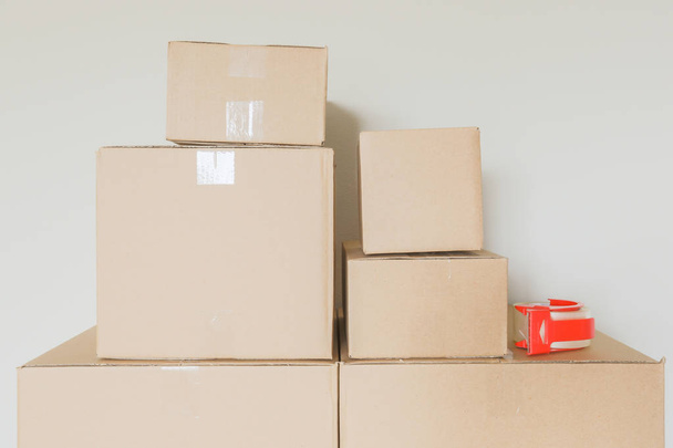 Variety of Packed Moving Boxes In Empty Room - Fotoğraf, Görsel
