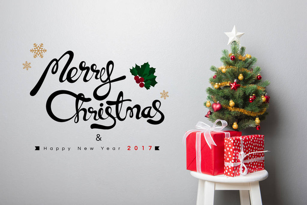 MERRY CHRISTMAS and HAPPY NEW YEAR 2017 text on the wall - Photo, Image