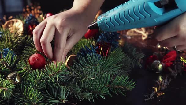 Close up view of making Christmas wreath - Footage, Video