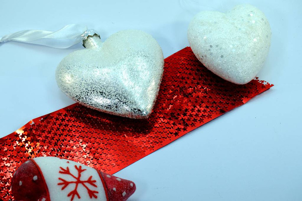 Three white hearts on a red headband  - Photo, Image